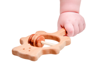 Baby hand and toy rattle abacus, close-up, isolated on a white background. Children fingers and an object on a white background