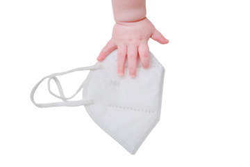 Baby hand and medical mask n95, close-up, isolated on a white background. Children fingers and an object on a white background
