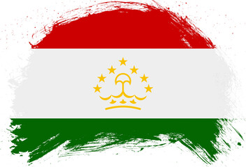 Distressed stroke brush painted flag of tajikistan on white background