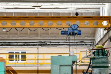 Overhead crane for lifting parts, assemblies and mechanisms at the factory.