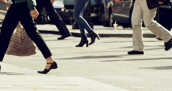 Travel, cross and shoes of business people in city for commute, transportation and traffic. Workforce, journey and walking with crowd of pedestrians in street for working, urban and morning rush