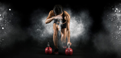 Muscular woman workout with kettlebell - obrazy, fototapety, plakaty