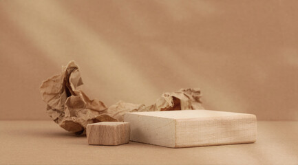 Wooden eco rustic platform podium on beige. Minimal empty display product presentation scene. Lght and shadow background.