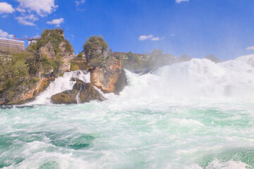 Fototapeta na wymiar View of Rhine Falls in Schaffhausen canton, Switzerland. Most powerful waterfall in Europe