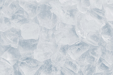 Natural crystal clear heap of crushed ice, ice cubes on the white surface background. - 551358080