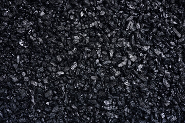 Fuel for furnace heating - hard coal. Pile of natural black hard coal for texture background. Best...