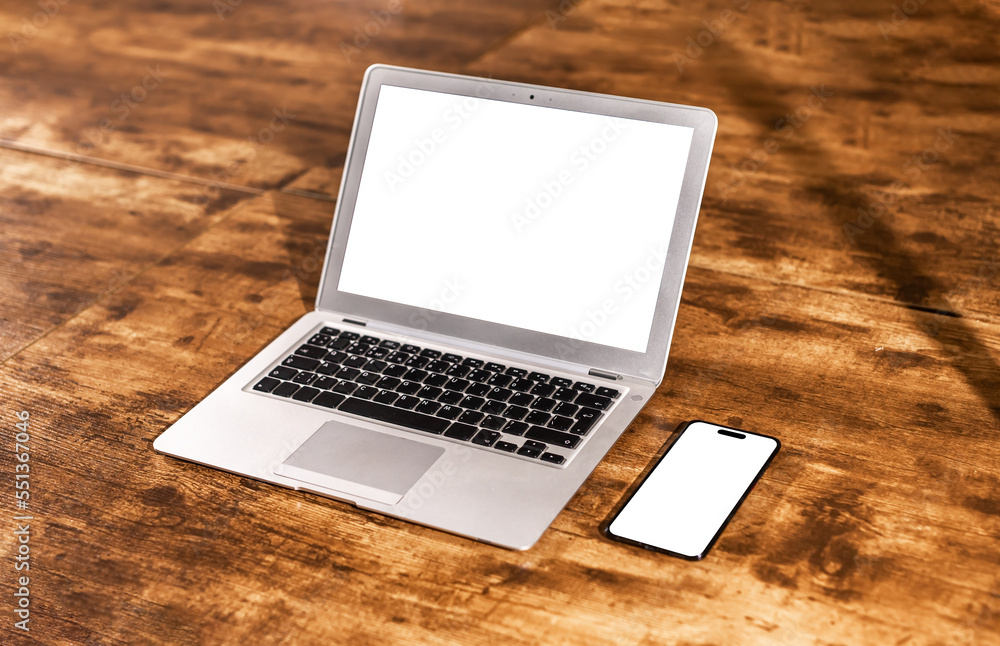 Poster laptop display and smartphone screen mockups on wood desk, table for application, mobile app and web