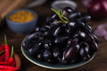 dark grapes on the table