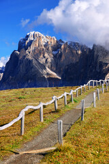 Iconic view of Seiser Alm (Alpe di Siusi) with Sassolungo and Sassopiatto mountains, South Tyrol, Italy, Europe