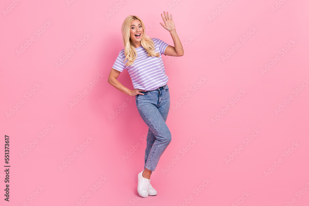 Sticker Full length photo of astonished glad person arm palm waving greeting isolated on pink color background