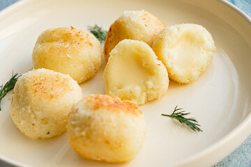 Deep fried Cheese ball on plate