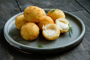 Deep fried Cheese ball on plate