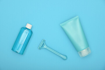 Feminine shaving set on blue