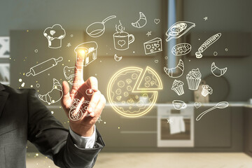Close up of businessman hand pointing at creative glowing digital food sketch on blurry kitchen backgroound. Online food delivery concept.