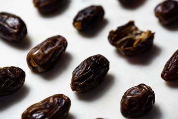 Dates fruit pattern on white background. Dried organic Superfood.