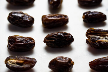 Dates fruit pattern on white background. Dried organic Superfood.