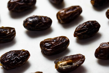 Dates fruit pattern on white background. Dried organic Superfood.