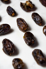 Dates fruit pattern on white background. Dried organic Superfood.