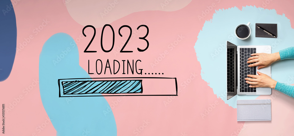 Aufkleber loading new year 2023 with person using a laptop computer