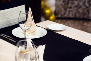 Banquet table with wineglasses. High angle of elegant banquet table served for wedding celebration