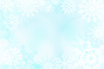 Elegant snowflake winter sky in light blue and white colors. Snowflake wallpaper background. Snowy winter wonderland scene with copy space. Blizzard background