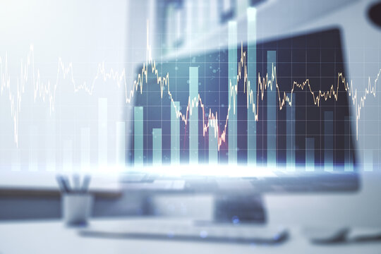 Double exposure of abstract creative financial diagram and modern desk with computer on background, banking and accounting concept