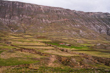 authentic nature of dagestan and its mountainous terrain and beautiful rocky views, mountains and a farm house farm against the backdrop of all the beautiful landscapes