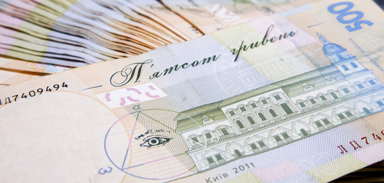 Close-up of Ukrainian hryvna money. many bills of hryvnia. High quality photo