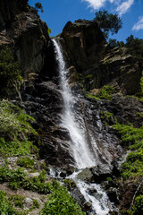 High beautiful waterfall on the Caucasus Mountains