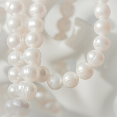 Nature white string of pearls in soft focus. Holidays background