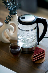 electric tea maker on non-isolated background 