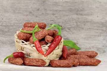 Mini sausages on a wooden board