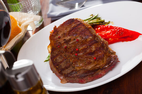 Steak beef with stewed green beans and pepper. High quality photo
