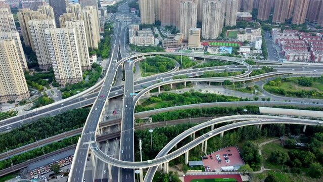 Aerial drone shot of traffic on city streets in daylight Nanchang China