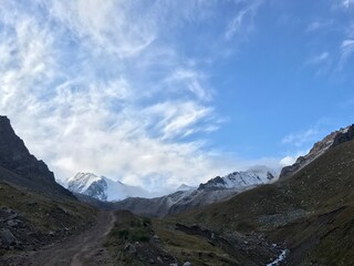 landscape with sky and clouds over the mounatin road