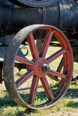 Fototapeta na wymiar Detail of steam locomotives old rusty wheel - Chiloe Island, Chile