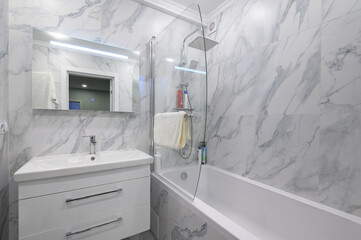 Modern white marble bathroom interior