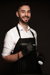 Manicur master man in working form with tools in hand. Nail photo content