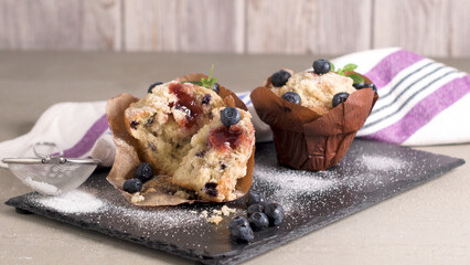 Muffins with red fruits jam fill