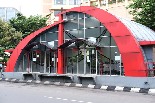 Semarang, Indonesia - June 6 2021 : Trans Semarang Inter City bus (BRT transportation) stop at Simpang Lima Halte.
