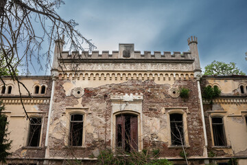 Obraz premium Dvorac Lazarevic castle in the afternoon. Also called dva dvorca porodice lazarevic, it's a 19th century mansion, abandoned since the 20th century, a symbol of the Serbian heritage in banat region...