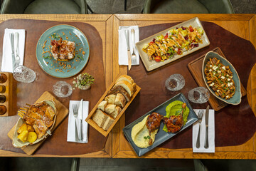Food served on a restaurant table, top view