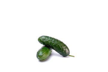 Ripe fresh green cucumbers isolated on a white background