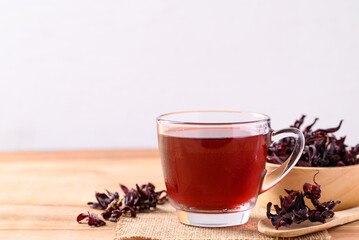 Roselle tea in cup glass with dry roselle, Herbal drink for reduction in blood pressure