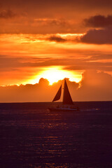 sunset with sailboat