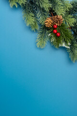 Fototapeta na wymiar Christmas composition. festive decor on blue background. Copy space, flat lay, top view.