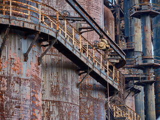 Walkway for turn-of-the-century works wrap around the steel tanks of the abandoned Bethlehem Steel Works in Pennsylvania