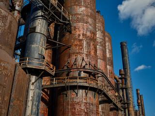 Steel tanks and smoke stacks of the abandoned Bethlehem Steel mill rusting