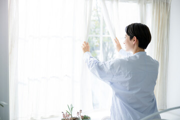 Profile of a woman changing air