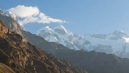 Nanga Parbat mountain peak with glacier and green pine forrest from Fairy Meadow. Gilgit, Pakistan